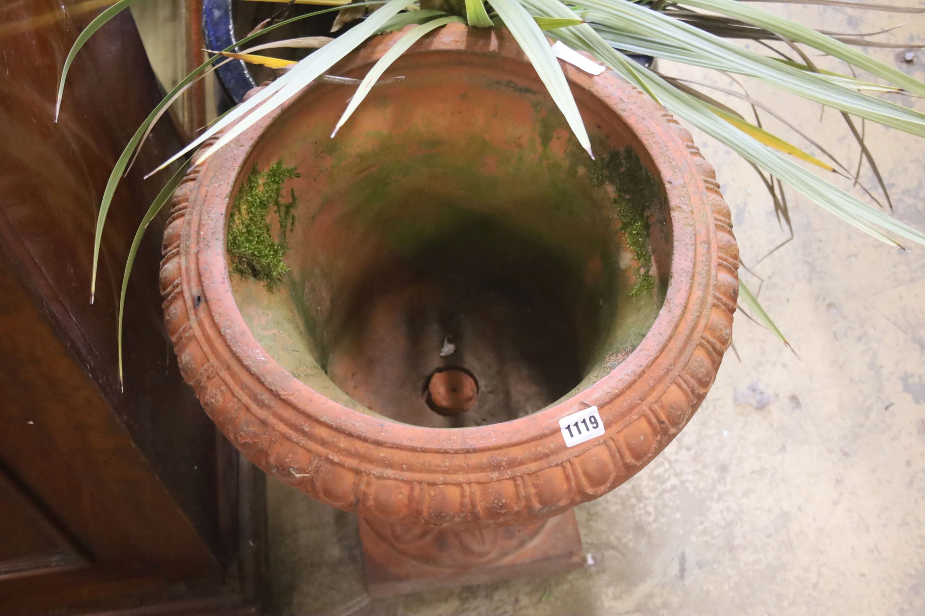 A Victorian terracotta campana garden urn on stand, diameter 48cm, height 58cm